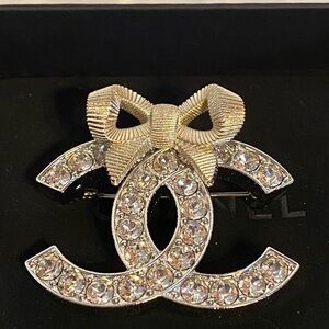 New authentic Chanel Gold and Silver Crystal Bow Brooch